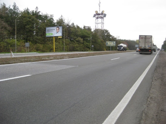 Фото рекламной плоскости по адресу трасса Киев-Харьков_км 48+050_левый // из Киева