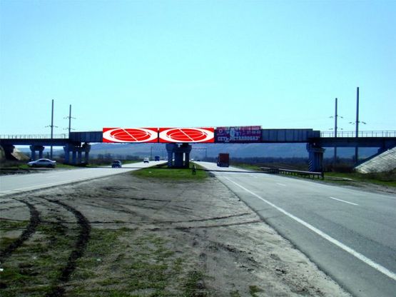 Фото рекламной плоскости по адресу Киевская трасса 70 км / Краснознамянка №3 (из Киева)