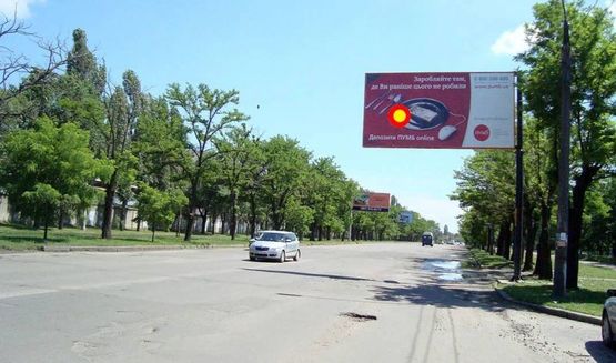 Фото рекламной плоскости по адресу пр.Богоявленский - ост."Старокрепостная" Г-образный щит над дорогой, стА