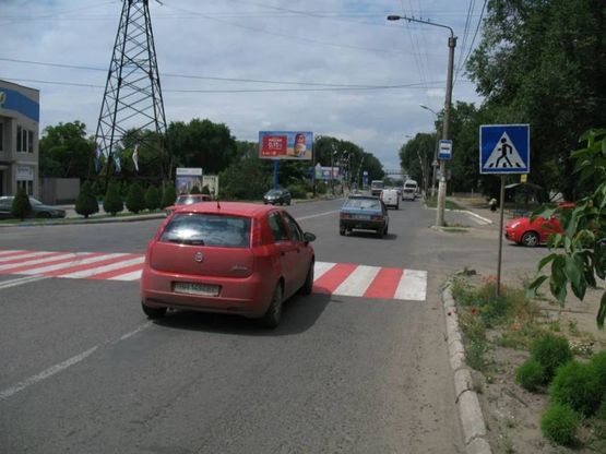 Фото рекламної площини за адресою ул.Школьная-ул.К,Маркса, р-н "28 июня,АЗС "ТНК", Ж-Д переезд