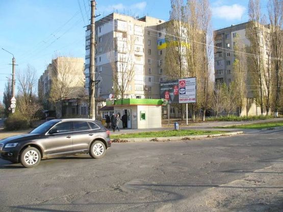 Фото рекламної площини за адресою ул.Победы-Бугазская(РЫНОК), АТБ, рынок "Победа", Кафе, Библиотека. АТБ