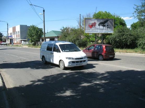 Фото рекламної площини за адресою ул.Школьная, Автомойка, ул.Школьная-ул.Приморская, Универсам "Приморский",р-н "28 июня,Автомойка, шиномонтаж