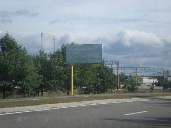 Фото рекламной плоскости по адресу трасса Киев-Обухов-Знаменка_км 35+450_левый // из Киева
