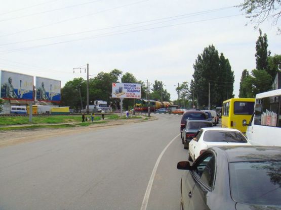 Фото рекламной плоскости по адресу Дальницкое шоссе / ул. Крайняя (Рынок) №1