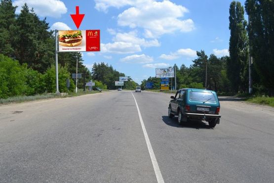Фото рекламной плоскости по адресу ул.Залютинская -развязка с окружной - флажок№1-въезд в город со ст. Солоницевки