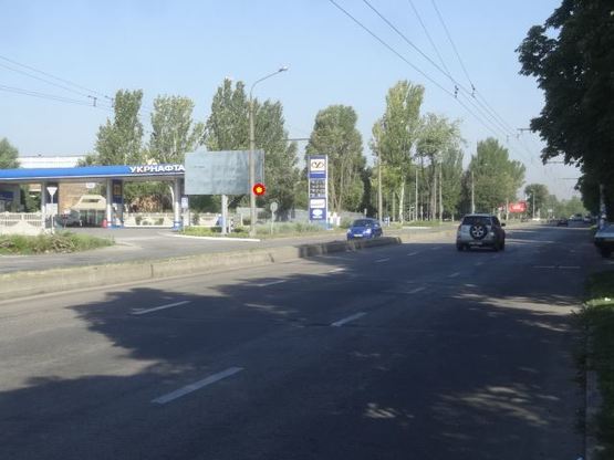 Фото рекламной плоскости по адресу вул.Перемоги - Вознесенівський ринок, АЗС "ТНК", ст.Б