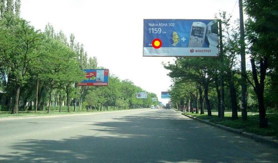 Фото рекламної площини за адресою пр.Богоявленский, 43 (Офис Энергобанка) Г-образный щит над дорогой, стА