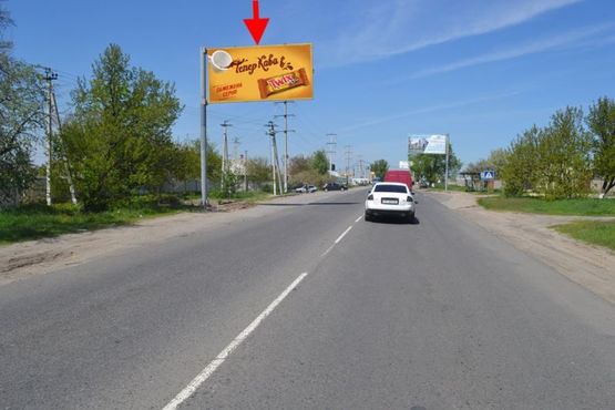 Фото рекламной плоскости по адресу Пр-т Гагарина - развязка с окружной, возле АЗС "ОВИС"-флажок№3 (въезд в город)