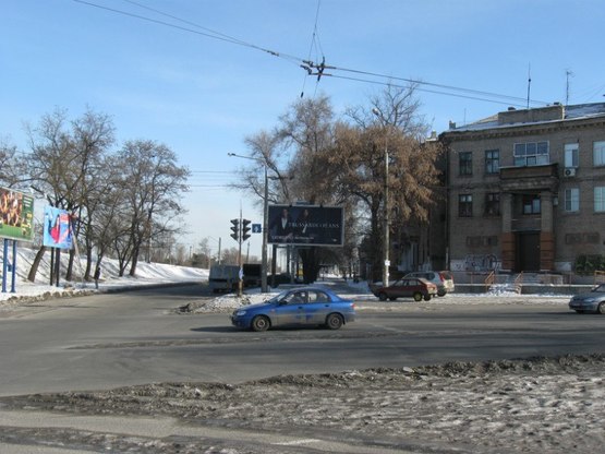 Фото рекламной плоскости по адресу вул.Перемоги - вул.С.Тюленіна (призматрон)