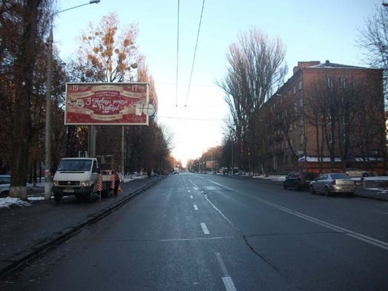 Фото рекламной плоскости по адресу ул. Академика Янгеля (напротив кафе "Меркурий")