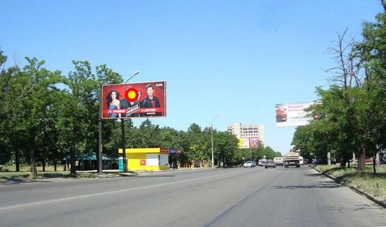 Фото рекламной плоскости по адресу пр.Богоявленский - ост."Старокрепостная" Г-образный щит над дорогой, стБ
