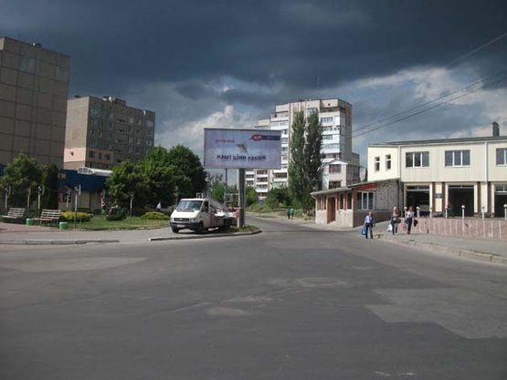 Фото рекламной плоскости по адресу ул. Николая Ващука - ул. Порика (маг. "Гранд")