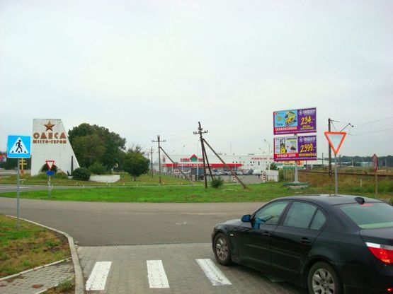 Фото рекламної площини за адресою Киевское шоссе / СГ "Новая Линия" / АЗС