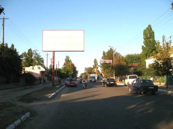 Фото рекламної площини за адресою ул.Измаильская, ЖБИ, ул.Измаильская, р-н ЖБИ, "4-школы", бар "Агава",магазин