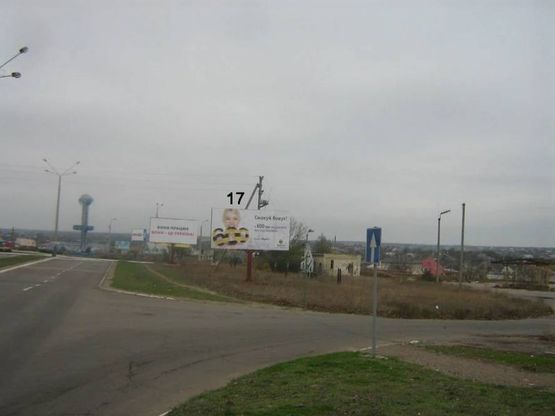 Фото рекламної площини за адресою г.Южный, Конец разд полосы, перекресток дорог на Сычавку порт справа