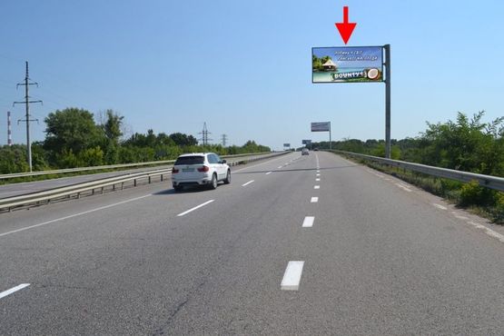 Фото рекламной плоскости по адресу Эстакада-пос.Песочин-въезд в город со ст.трассы Киев-Харьков-Довжанский