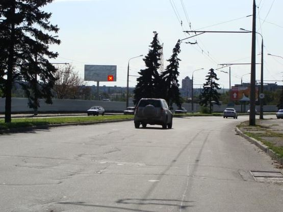 Фото рекламной плоскости по адресу вул.Перемоги,129а - напроти БК "Титан";  рядом с АЗС ВОГ, ст.Б