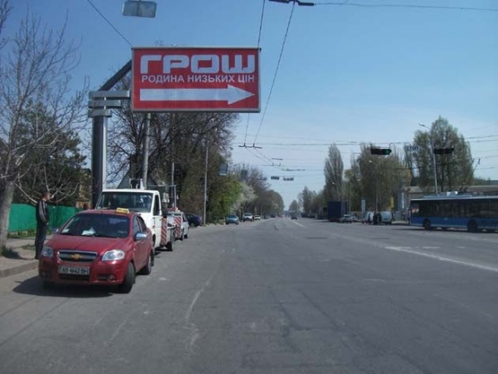 Фото рекламной плоскости по адресу Немировское шоссе (напротив "Грош")