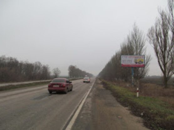 Фото рекламної площини за адресою Тр.Днепропетровк-Запорожье, 4000м до поста ГАИ