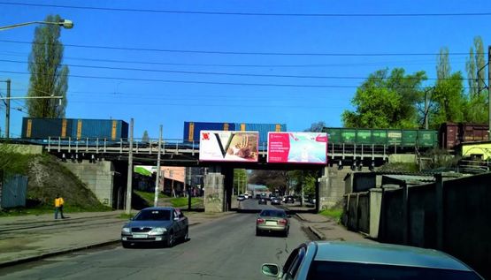 Фото рекламной плоскости по адресу ул. Маловского / Дюковский сквер (из  центра) №1