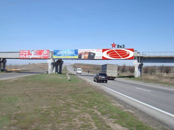 Фото рекламної площини за адресою Киевская трасса 70 км / Краснознамянка №1 (из Одессы)