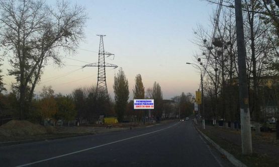 Фото рекламной плоскости по адресу Ул. Шолуденко, рядом с "Шиномонтажем"
