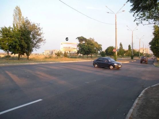 Фото рекламної площини за адресою г.Южный, Разделительная полоса от якоря, заправка слева