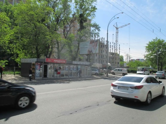 Фото рекламної площини за адресою ул.О.Трутенко,7 (к Окружной дороге, суперм.Метро и Эпицентр)