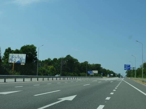 Фото рекламной плоскости по адресу трасса Киев-Житомир_км 43+550_левый // из Киева