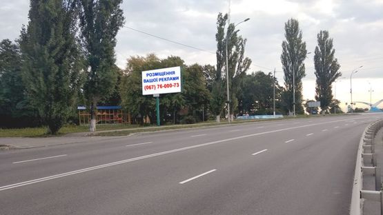 Фото рекламной плоскости по адресу Ул. Набережная, возле Пенсионного фонда