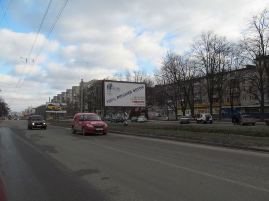 Фото рекламной плоскости по адресу Космическая-Восточная (из города)