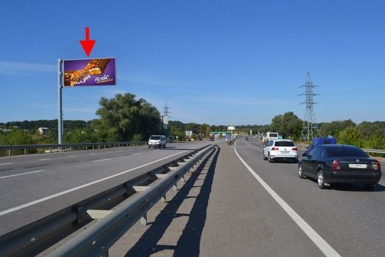 Фото рекламної площини за адресою Эстакада-пос.Песочин-выезд из города в ст.трассы Киев-Харьков-Довжанский