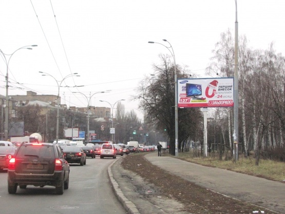 Фото рекламной плоскости по адресу Телиги Е. ул., (ст. м. Дорогожичи, парк Бабин Яр, в сторону Московского моста)