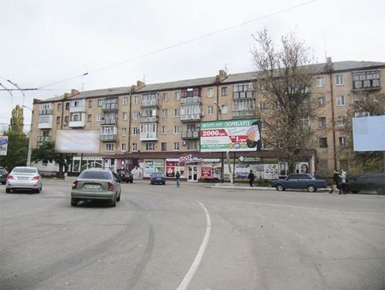 Фото рекламної площини за адресою Дружбы народов пл., 6 - Полтавская ул.