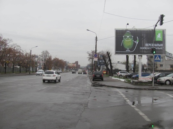 Фото рекламной плоскости по адресу Скляренко ул. (Куренёвский рынок, супермаркет Сильпо, конечная трамвая 16, по напрвлению Московского просп.)