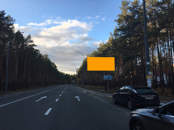 Фото рекламной плоскости по адресу ул. Университетская, возле кладбища (направление из Киева)