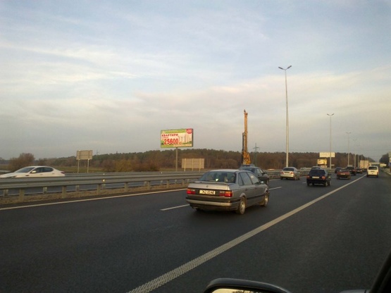 Фото рекламної площини за адресою Житомирская трасса 21км. - Стоянка - в направлении Киева