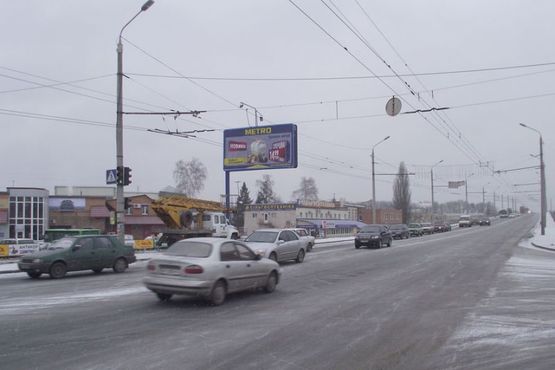 Фото рекламной плоскости по адресу вул. В.Тирновська / вул.Ковпака(шляхопровид)