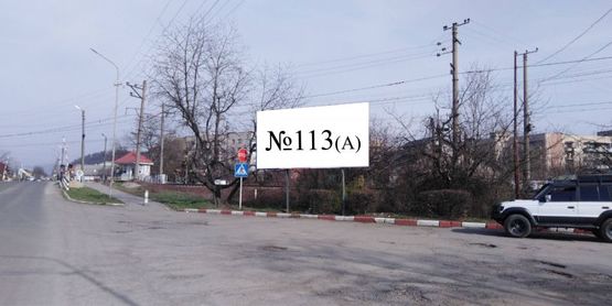 Фото рекламной плоскости по адресу вул. Духновича, перед переїздом