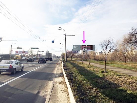 Фото рекламной плоскости по адресу Московский проспект, крупная транспортная развязка, направление м. Петровка (Метро Кеш энд Керри, ТРЦ "Блокбастер")