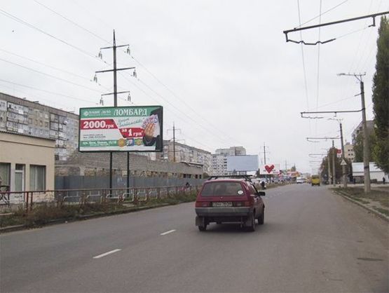 Фото рекламной плоскости по адресу Космонавта Попова ул., 15/18 (напротив)