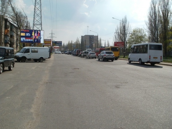 Фото рекламной плоскости по адресу ул. Космонавтов, 69 - напротив маг. Рассвет