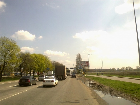 Фото рекламной плоскости по адресу Кольцевая дорога, поворот на  Рынок Столичный