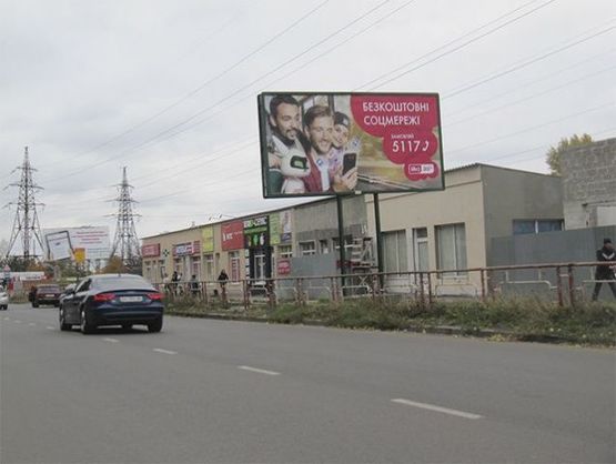 Фото рекламной плоскости по адресу Космонавта Попова ул., 15/18 (напротив)