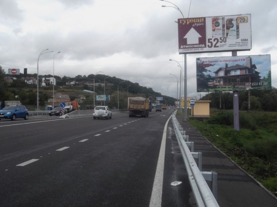 Фото рекламной плоскости по адресу Обуховская трасса 20км. - Лисники - в направлении Киева. Нижний