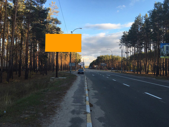 Фото рекламной плоскости по адресу ул. Университетская, возле кладбища (направление на Киев)