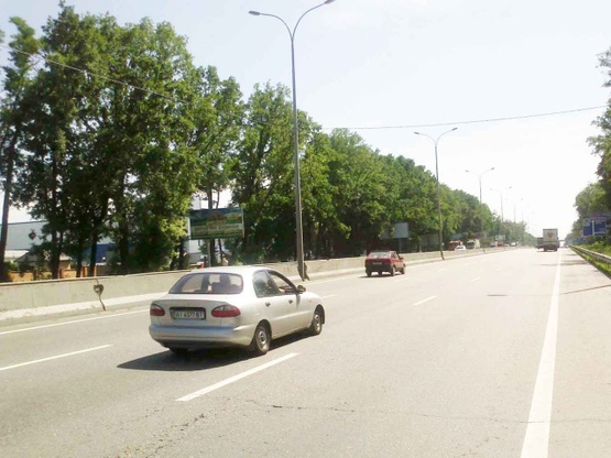 Фото рекламної площини за адресою Одесская трасса, 300 м от Новой Линии, в направлении Одессы