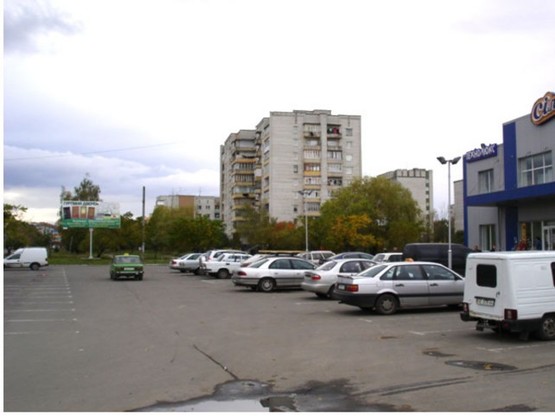 Фото рекламной плоскости по адресу вул.Володимира Великого ( сільпо)