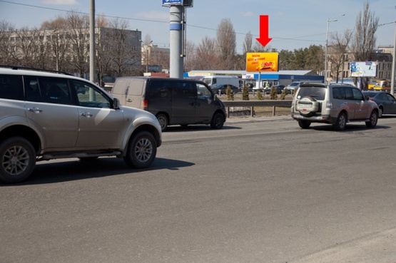 Фото рекламной плоскости по адресу Кольцевая дорога, возле ТЦ "Ашан", "Технополис", в сторону Победы пр-кт