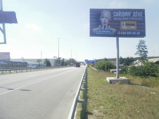 Фото рекламной плоскости по адресу Житомирская трасса 21км. - Стоянка - в направлении Житомира